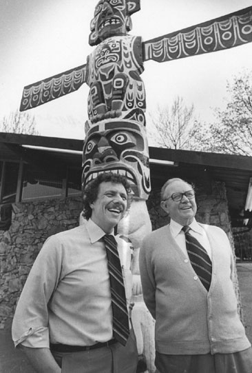 Chuck and Chick Chamberlain in front of restaurant